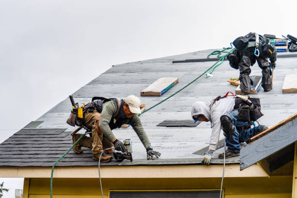 Professional Gutter Installation technician working in Henrietta, MO
